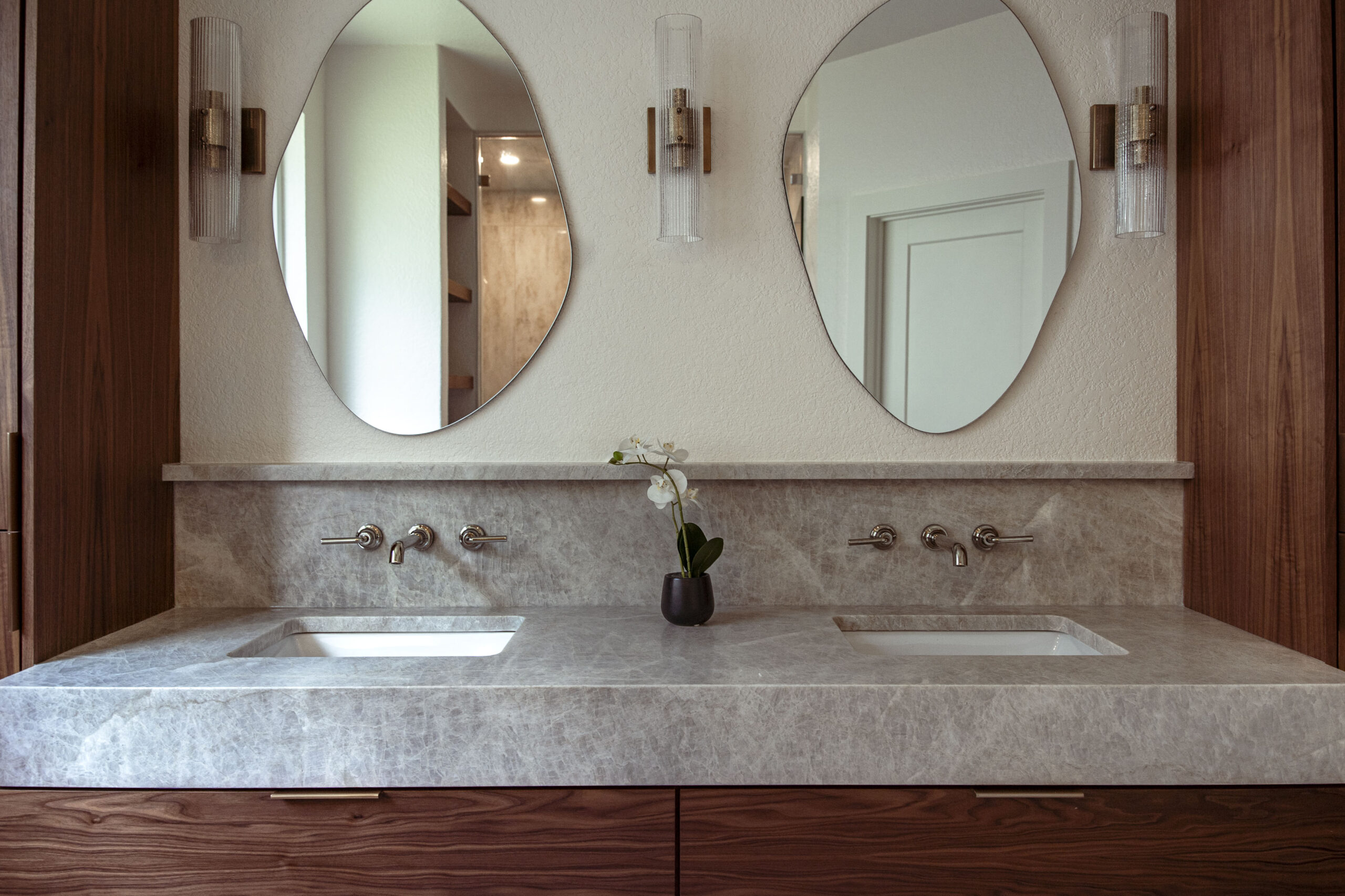 double sink mounted faucets asymmetrical mirrors bathroom remodel