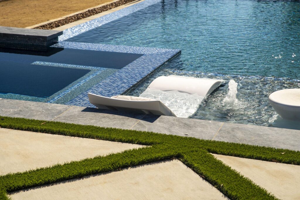 home addition infinity pool landscaping
