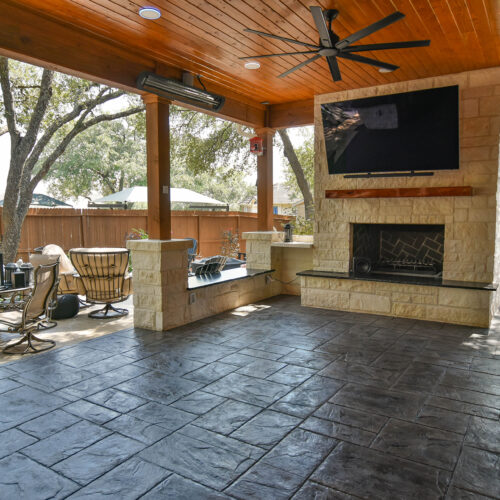 outdoor fireplace stone flooring wooden porch cover