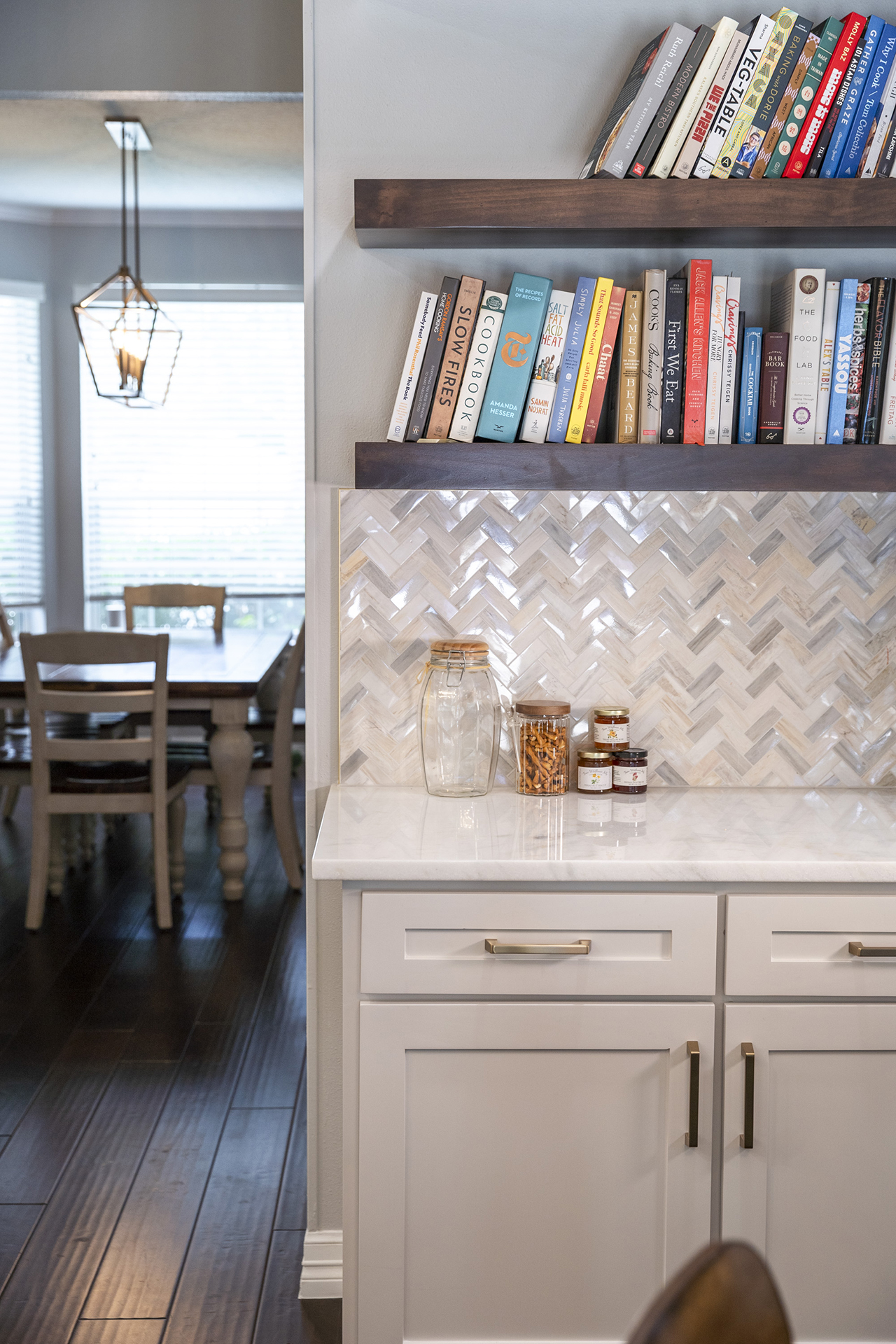 herringbone backsplash white countertops cabinets