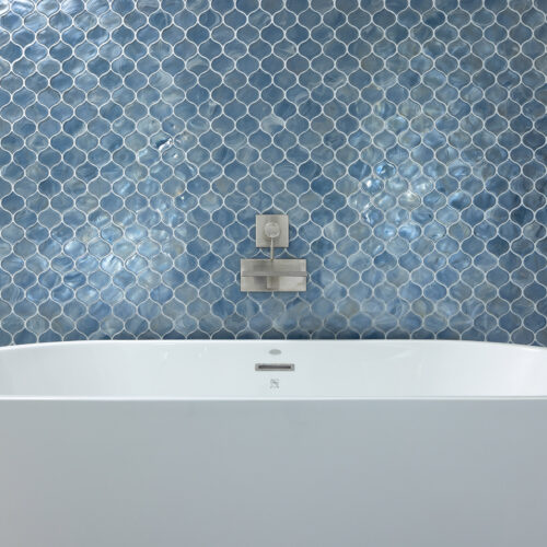tile backsplash free standing tub blue white bathroom