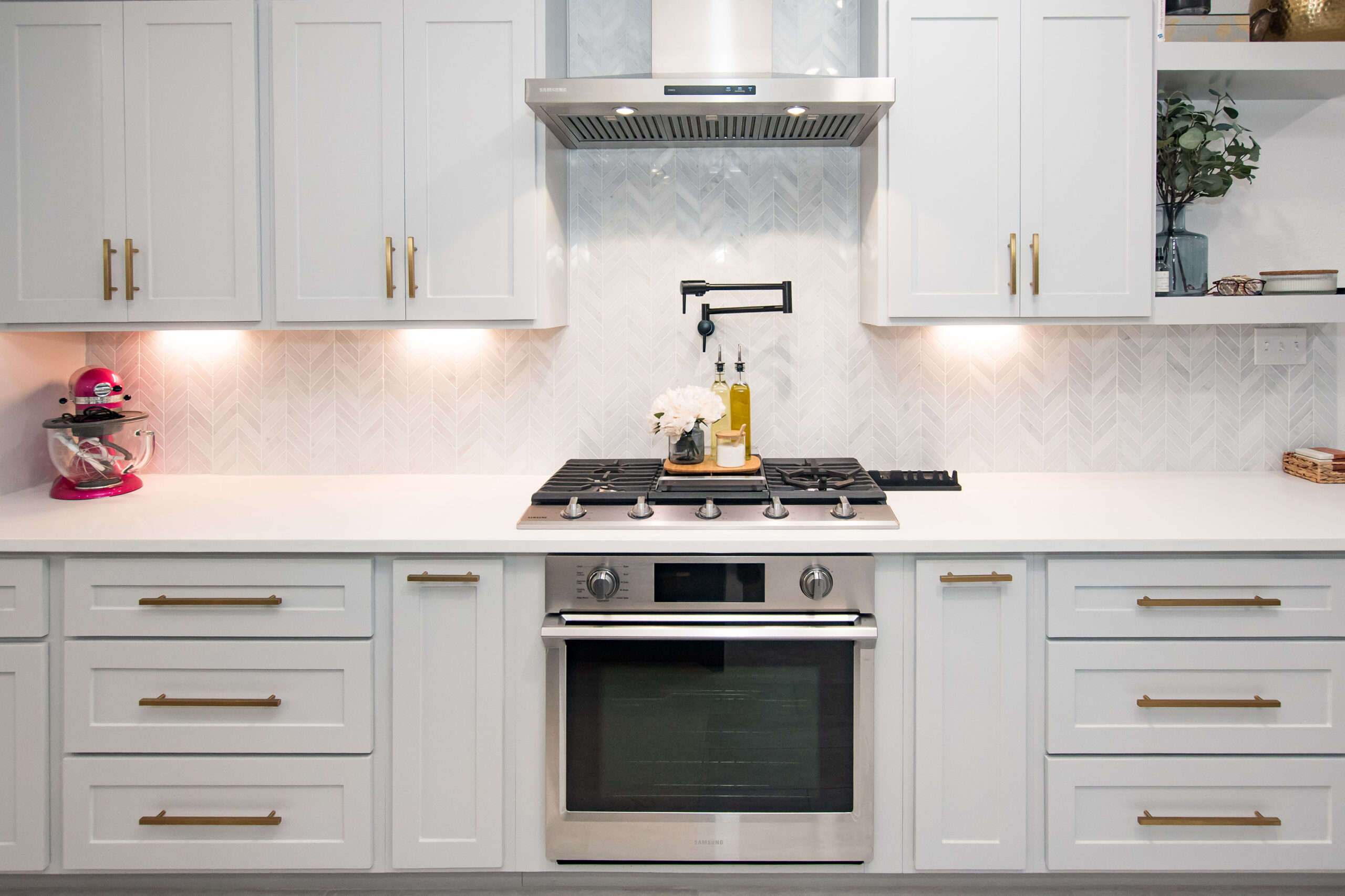 custom cabinets herringbone tile backsplash