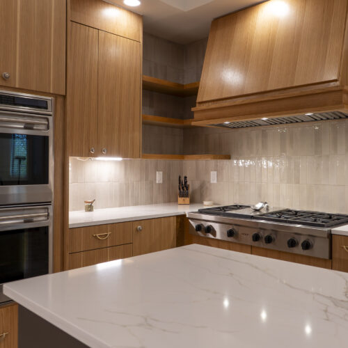 kitchen remodel, elm creek, warm wood tones, kitchen contractor, stone countertops, custom cabinets